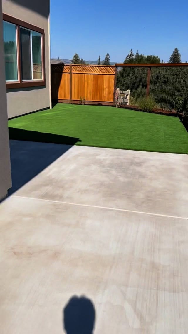 Concrete and turf patio combination